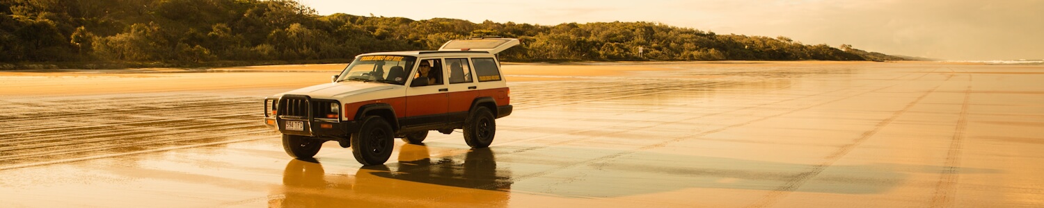 Driving along Fraser Island beach